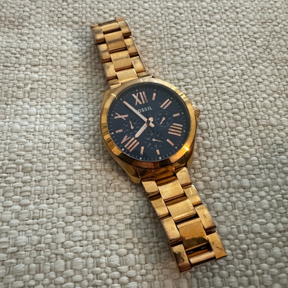 Fossil gold watch with blue face